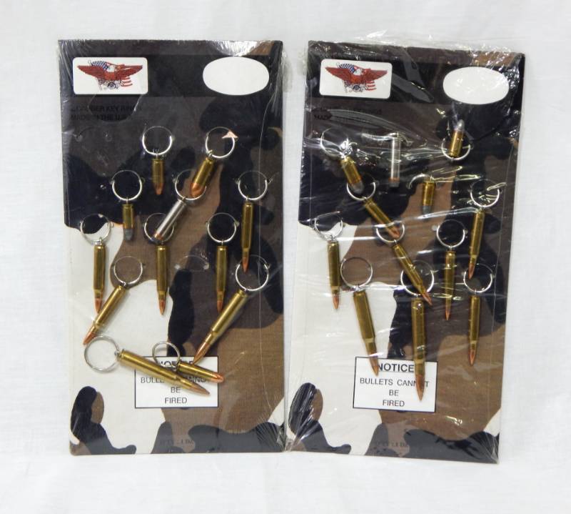 lot 26 image: Lot of New Vintage All Caliber Bullet Key Chains