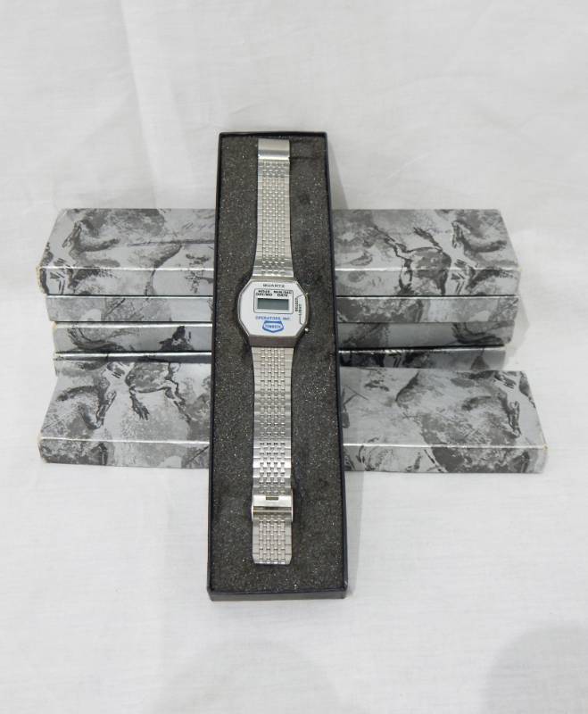 lot 28 image: Lot of Vintage Tenneco Operators Inc. Digital Quartz Watches