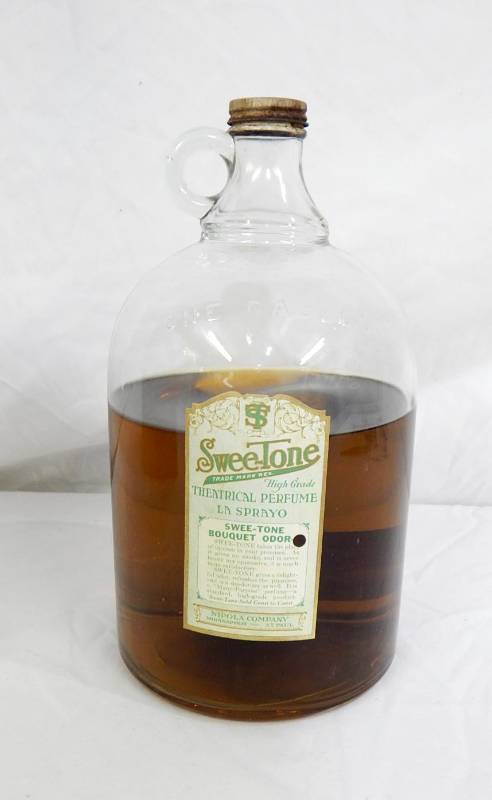 lot 2 image: Vintage 1920s Nipola Company Swee-Tone Perfume Gallon Jug With Historical Documentation