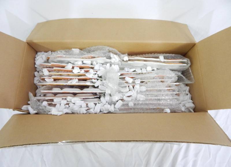 lot 85 image: Case of New Vintage Ceramic Carrot Themed Trivets