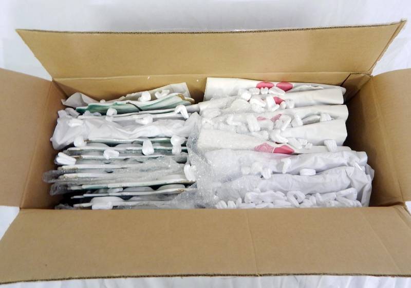 lot 88 image: Case of New Vintage Ceramic Green Onions Themed Trivets