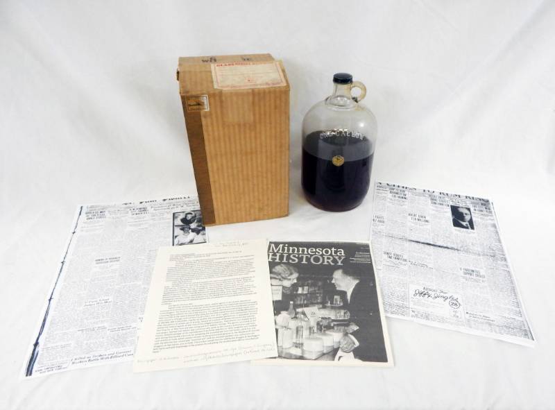 lot 1 image: Vintage 1920s Nipola Company Lucky Lindy Commemorative&nbspPerfume Gallon Jug With Historical Documentation