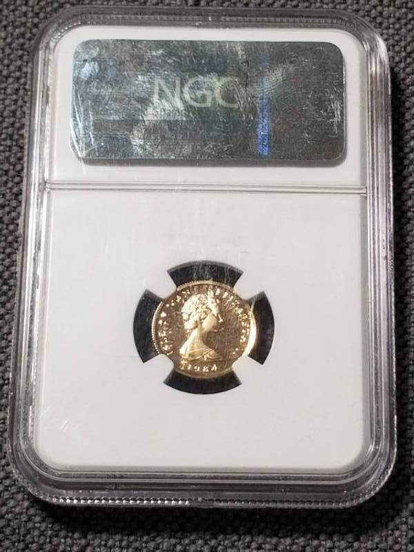 lot 12 image: 1984 ISLE OF MAN GOLD ANGEL PF70 ULTRA CAMEO NGC