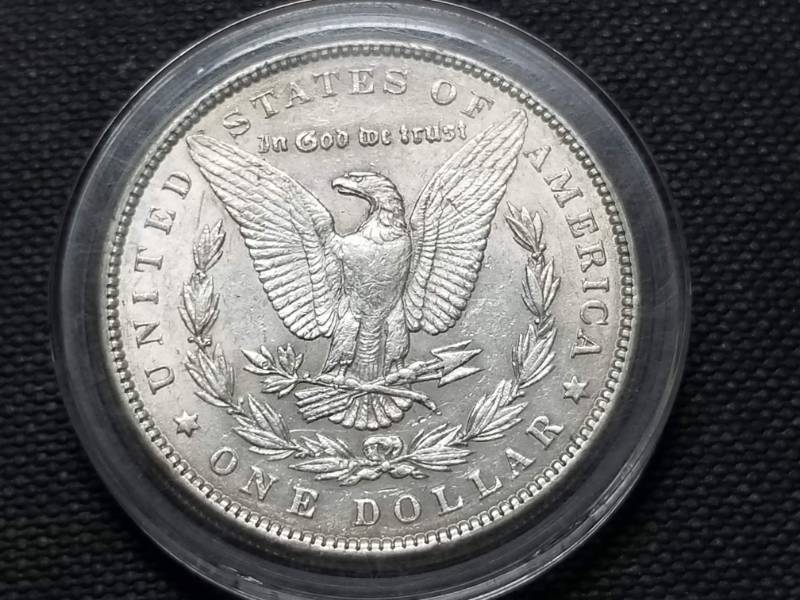 lot 17 image: 1889 MORGAN SILVER DOLLAR IN AIRTITE HOLDER