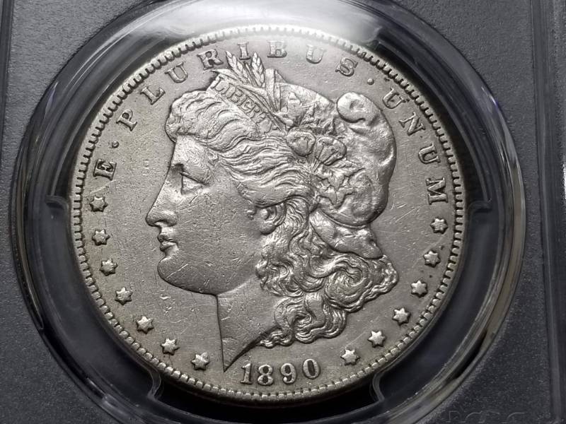lot 18 image: 1890-CC CARSON CITY MORGAN SILVER DOLLAR XF DETAILS PCGS