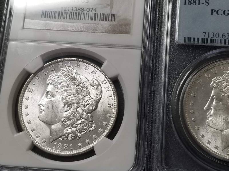 lot 41 image: 2 CERTIFIED MORGAN SILVER DOLLARS 1881-S & 1881-O PCGS-NGC MS63