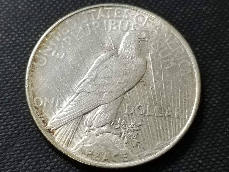 lot 56 image: 1923-D PEACE SILVER DOLLARAU58
