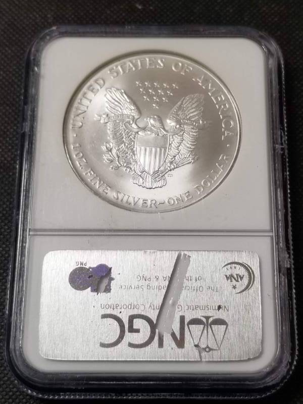 lot 58 image: 2000 AMERICAN SILVER EAGLE 1 TROY OZ. .999 FINE SILVER MS69 NGC