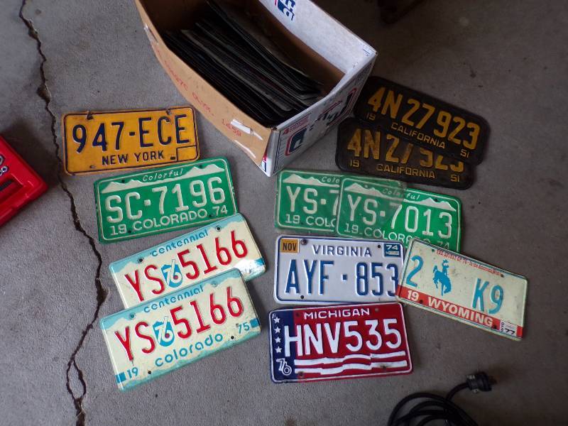 lot 29 image: Box of Assorted Vintage License Plates