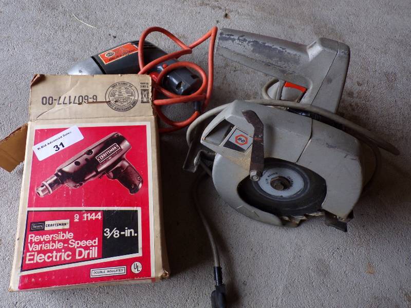 lot 31 image: Black N Decker saws one Skil saw one drill