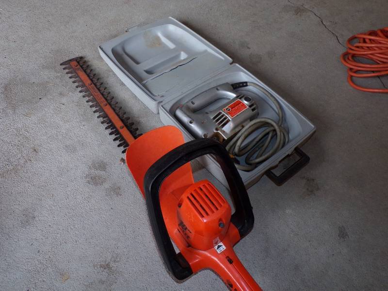 lot 32 image: Black N Decker Jig Saw one Hedge Trimmer