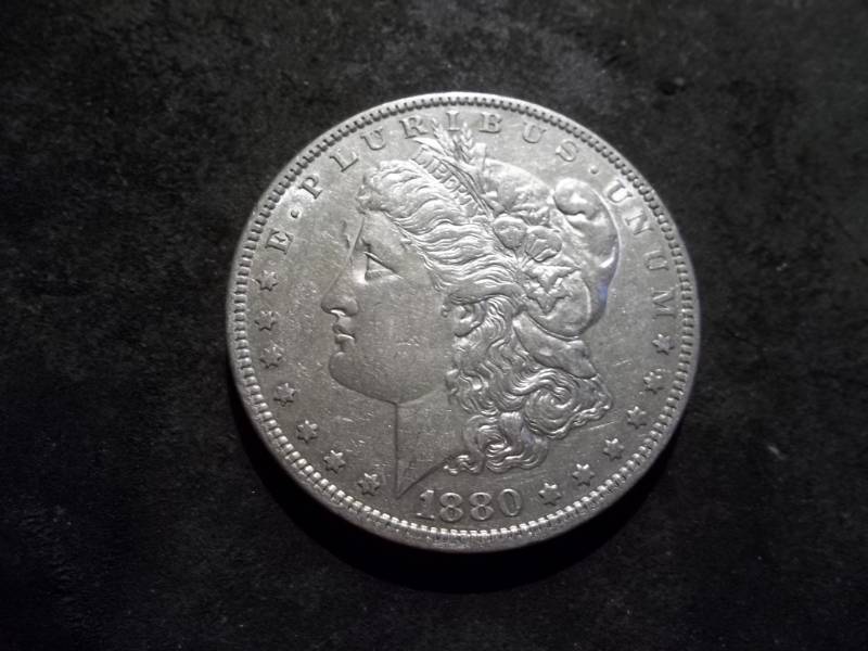 lot 9 image: 1880 O Morgan Silver Dollar