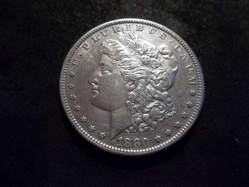 lot 10 image: 1880 S Morgan Silver Dollar