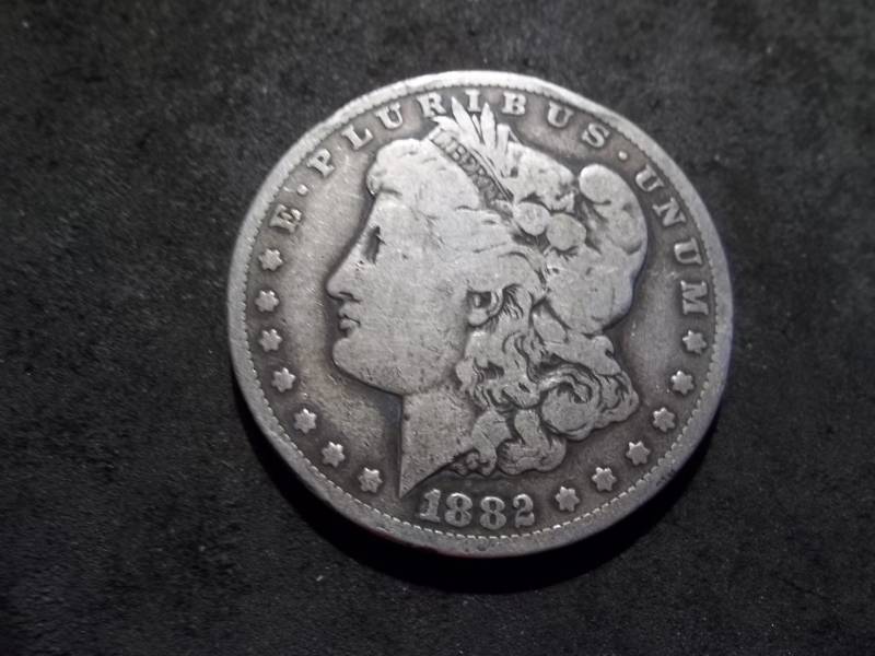lot 14 image: 1882 CC  Morgan Silver Dollar