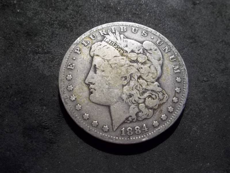 lot 19 image: 1884 S Morgan Silver Dollar