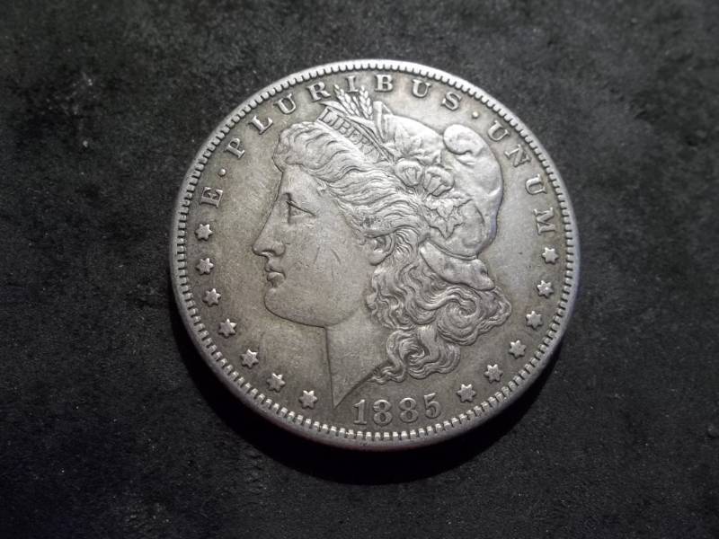 lot 21 image: 1885 S Morgan Silver Dollar
