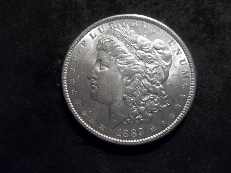 lot 23 image: 1889 Morgan Silver Dollar