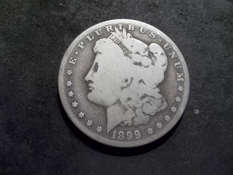 lot 32 image: 1899 O Morgan Silver Dollar