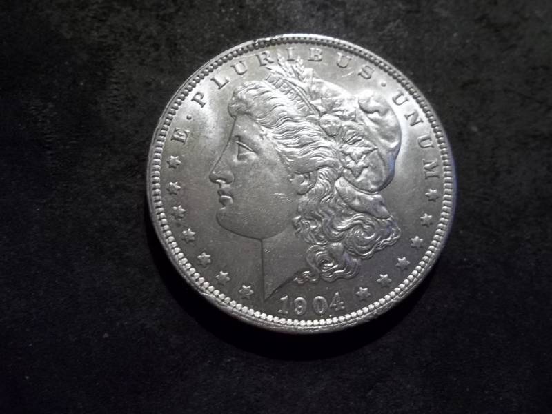 lot 39 image: 1904 O Morgan Silver Dollar