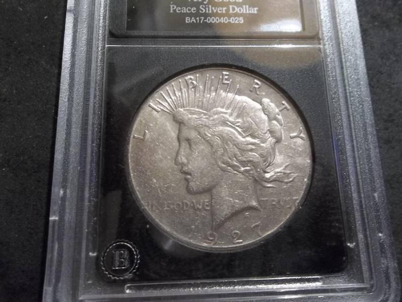 lot 51 image: 1927 Peace Silver Dollar