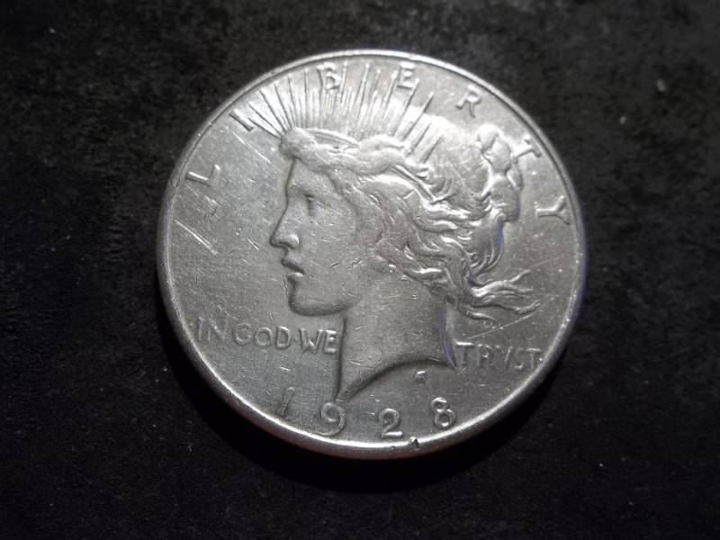 lot 54 image: 1928 S Silver Peace Dollar