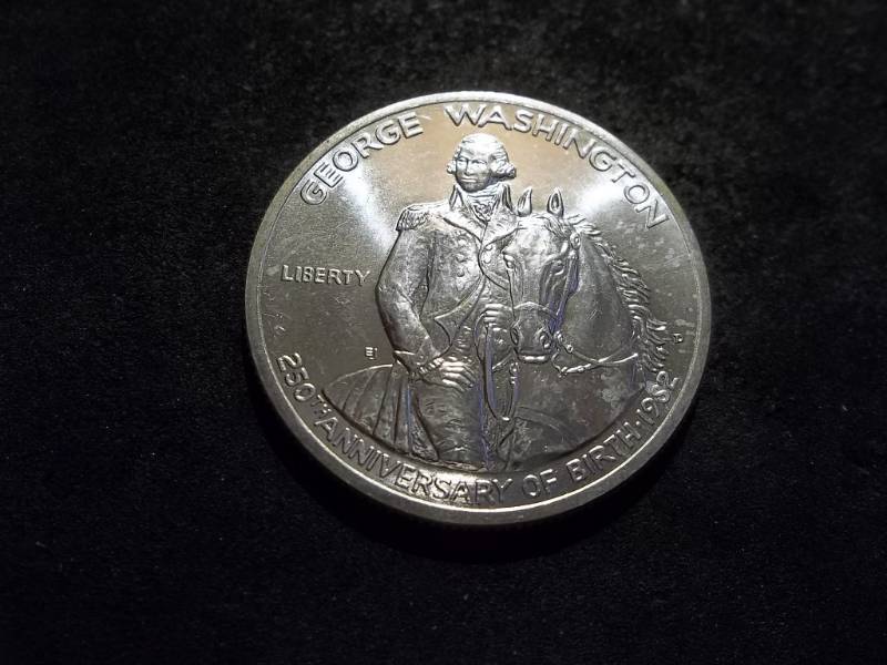 lot 83 image: George Washington 250th Birthday Commemorative Uncirculated Silver Half Dollar