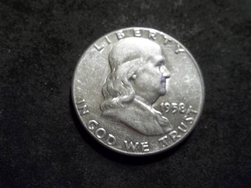 lot 114 image: 1958 Franklin Half Dollar