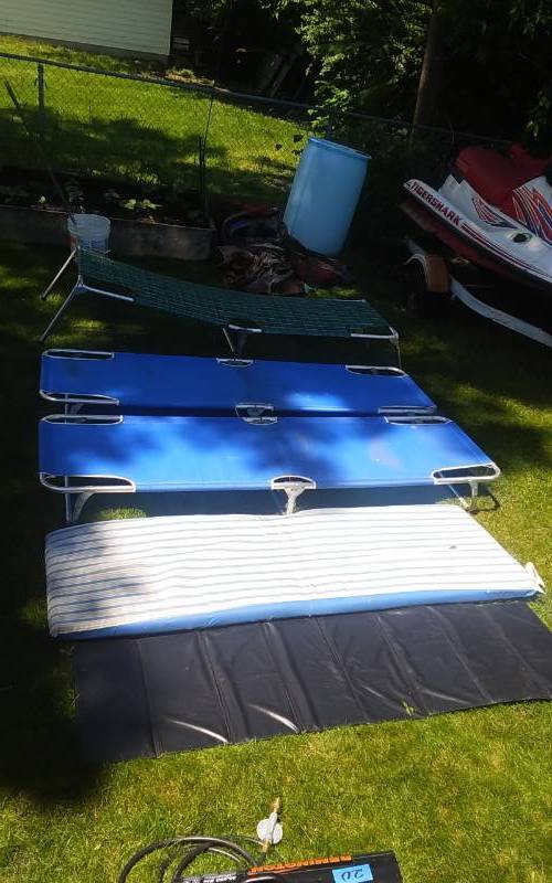lot 22 image: 3-Folding Cots, 1-Pad, 1-Mat