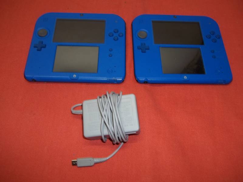 lot 144 image: Two Nintendo 2DS