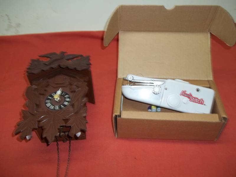 lot 83 image: Coocoo Clock and Portable Sewing Machine