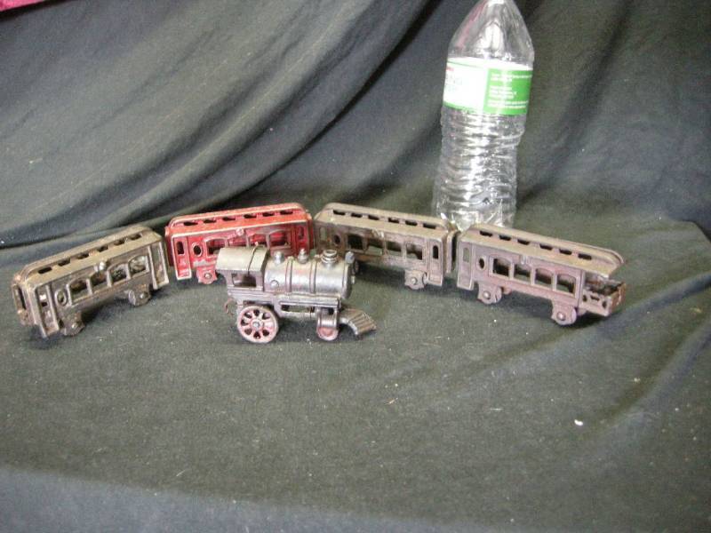 lot 55 image: Antique Cast Iron Train Set