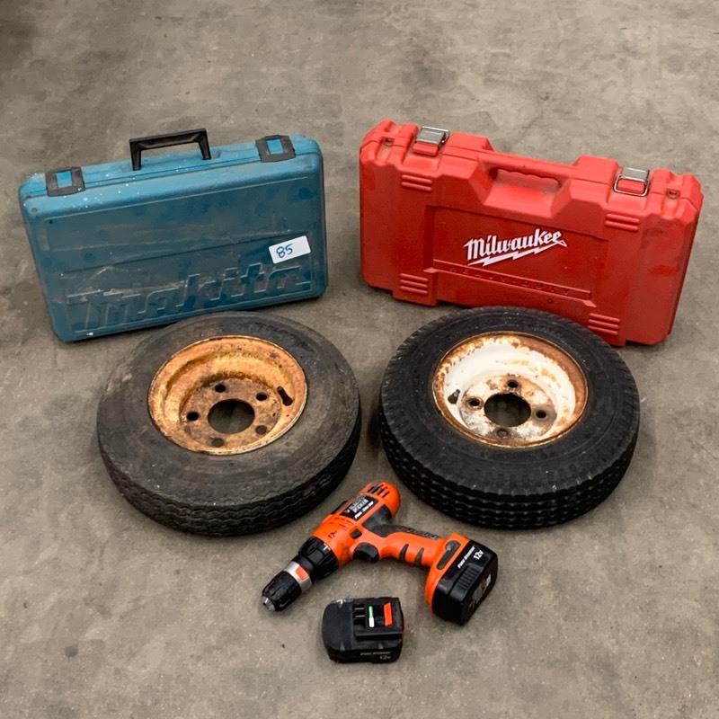 lot 85 image: (2) Tool Cases, (1) Cordless Drill, (2) Trailer Tires