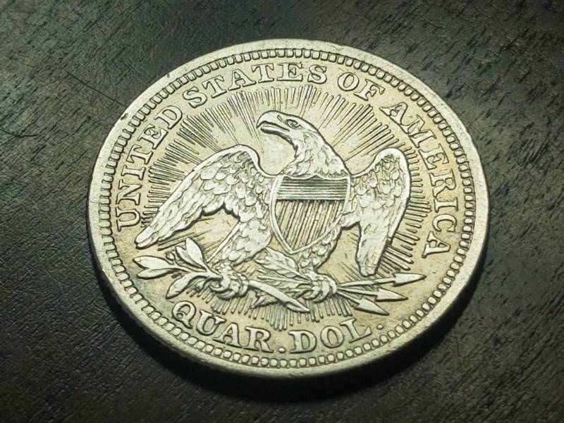 lot 42 image: 1853 arrows & rays SEATED QUARTER AU53
