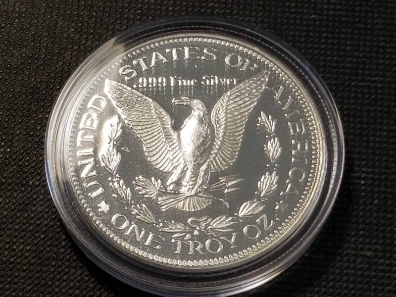 lot 17-A image: 1 TROY OZ. .999 FINE SILVER MORGAN DOLLAR DESIGN IN AIRTITE