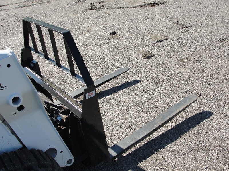 UNUSED KIVEL SKID STEER FORKS