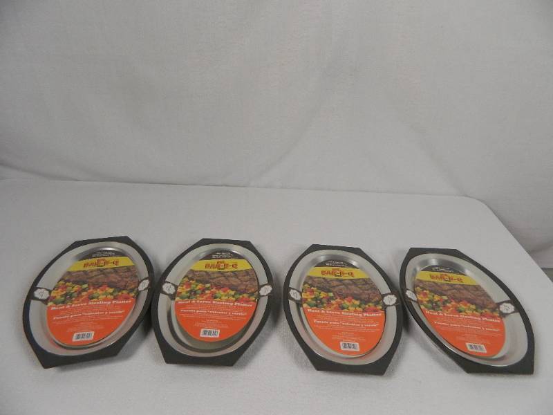 lot 36 image: 4 New Heat and Serve Sizzling Platters