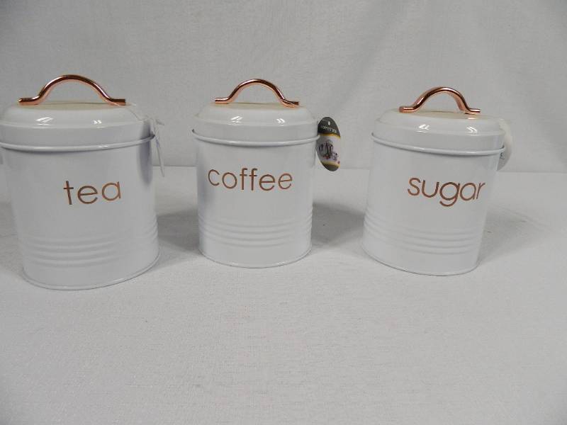 lot 41 image: New Super Cute Metal Canister Set