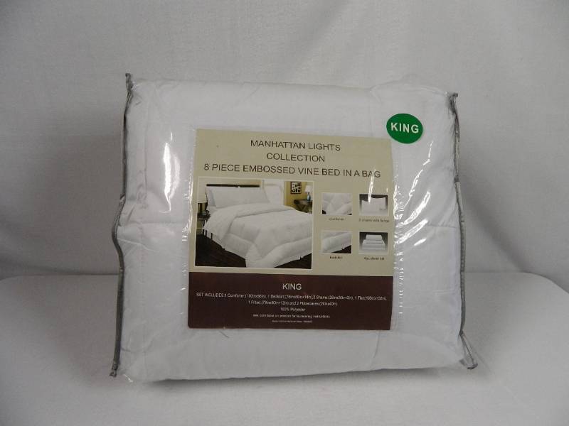 lot 44 image: New 8 Piece Embossed King Sized Bed in A Bag