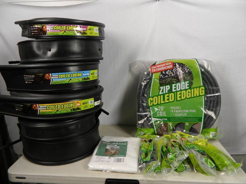 lot 62 image: Large Lot of Plastic Lawn Edging and Stakes