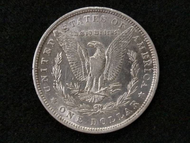 lot 8 image: 1879 Rev 79 Morgan Silver Dollar...