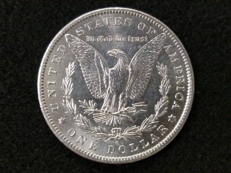 lot 19 image: 1884 O MS Morgan Silver Dollar...