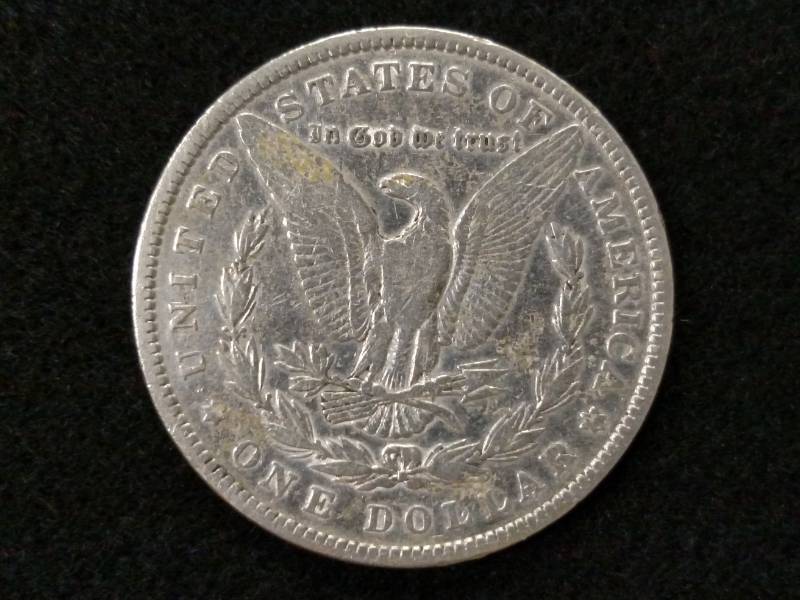 lot 20 image: 1885 Morgan Silver Dollar...