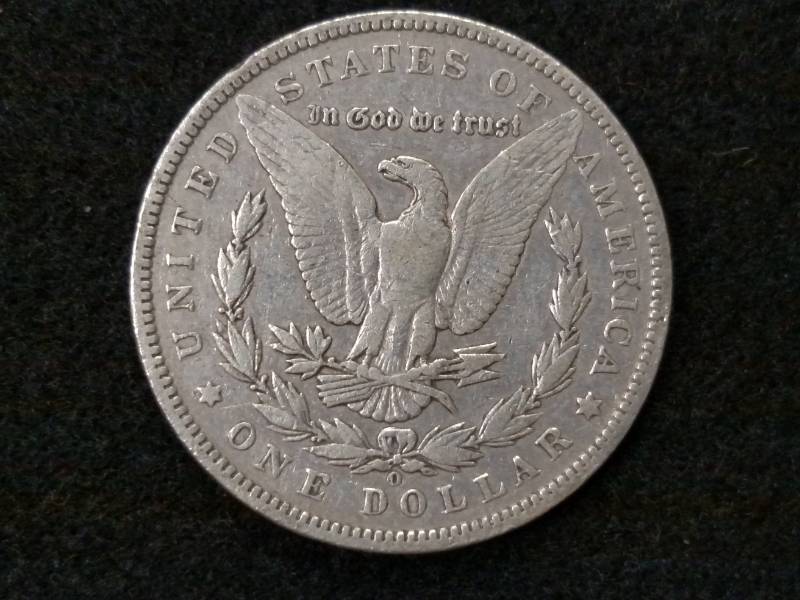 lot 35 image: 1899 O Morgan Silver Dollar...