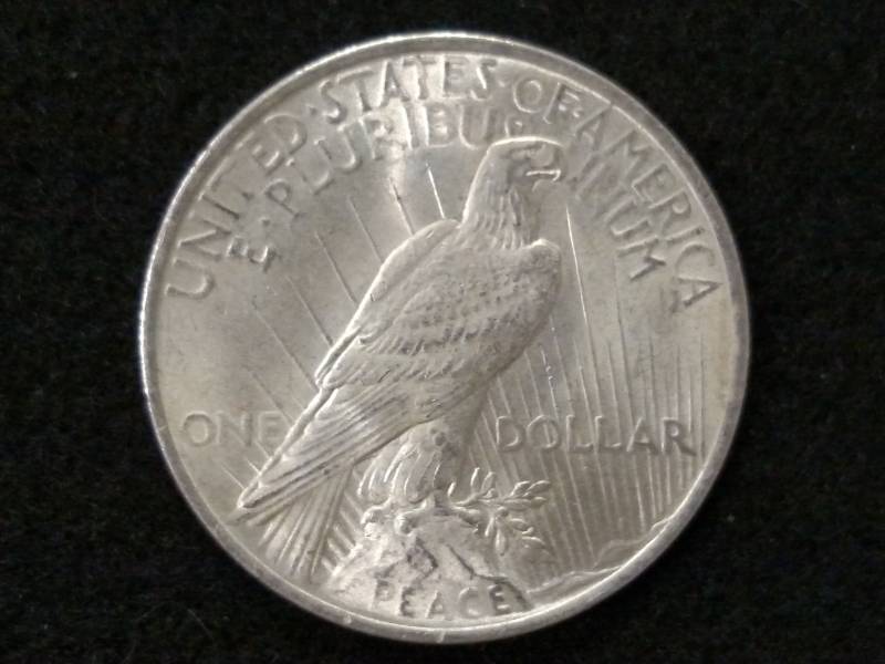 lot 52 image: 1922 Peace Silver Dollar...