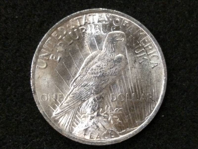 lot 53 image: 1922 Peace Silver Dollar...