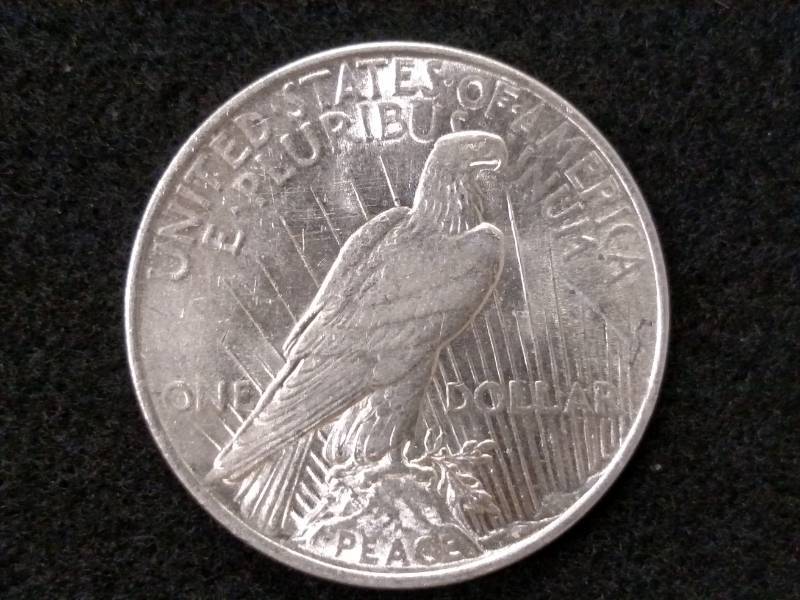 lot 55 image: 1922 Peace Silver Dollar...