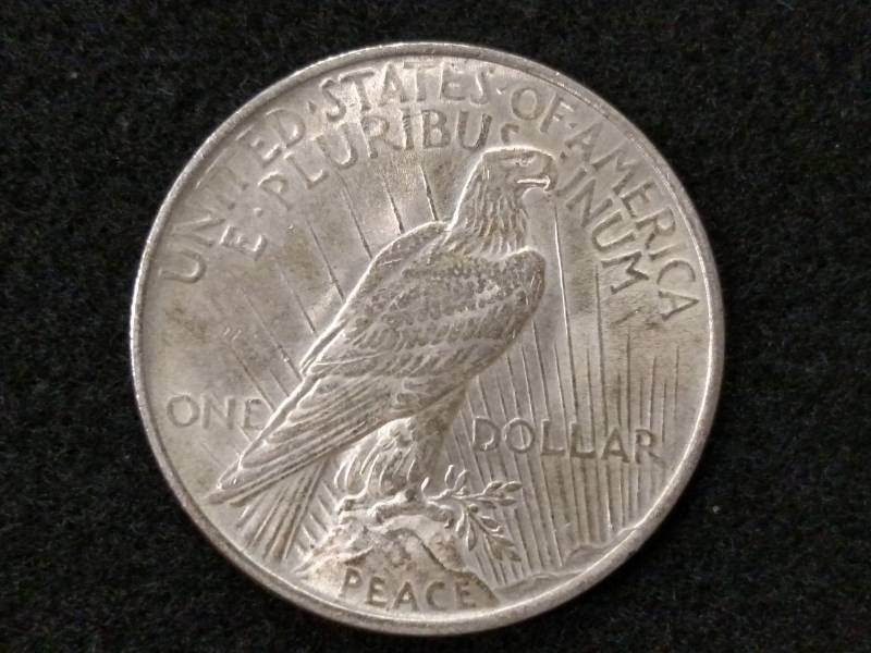 lot 56 image: 1922 Peace Silver Dollar...