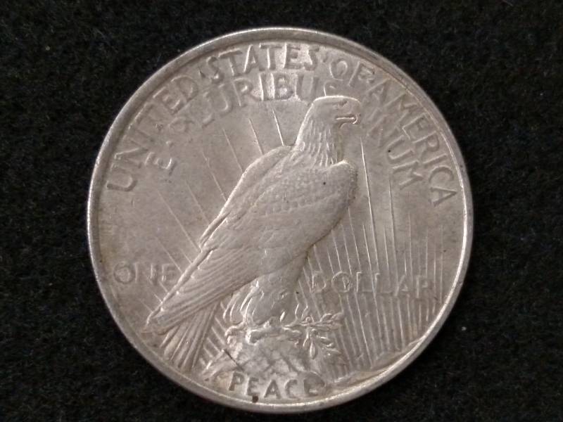 lot 57 image: 1922 Peace Silver Dollar...