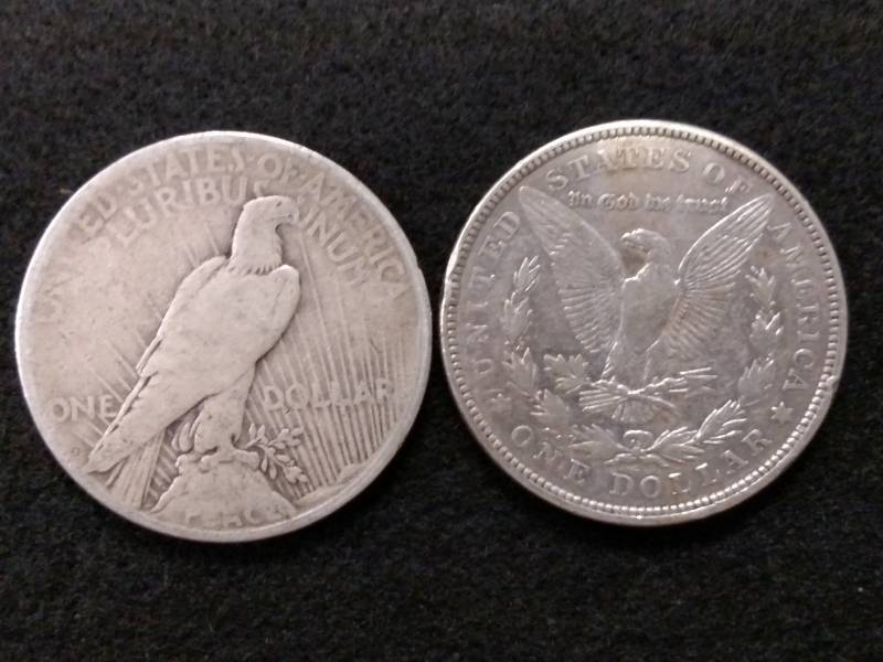 lot 82 image: (2) Silver Dollars...