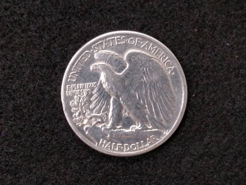 lot 101 image: 1940 Walking Liberty Silver Half D...